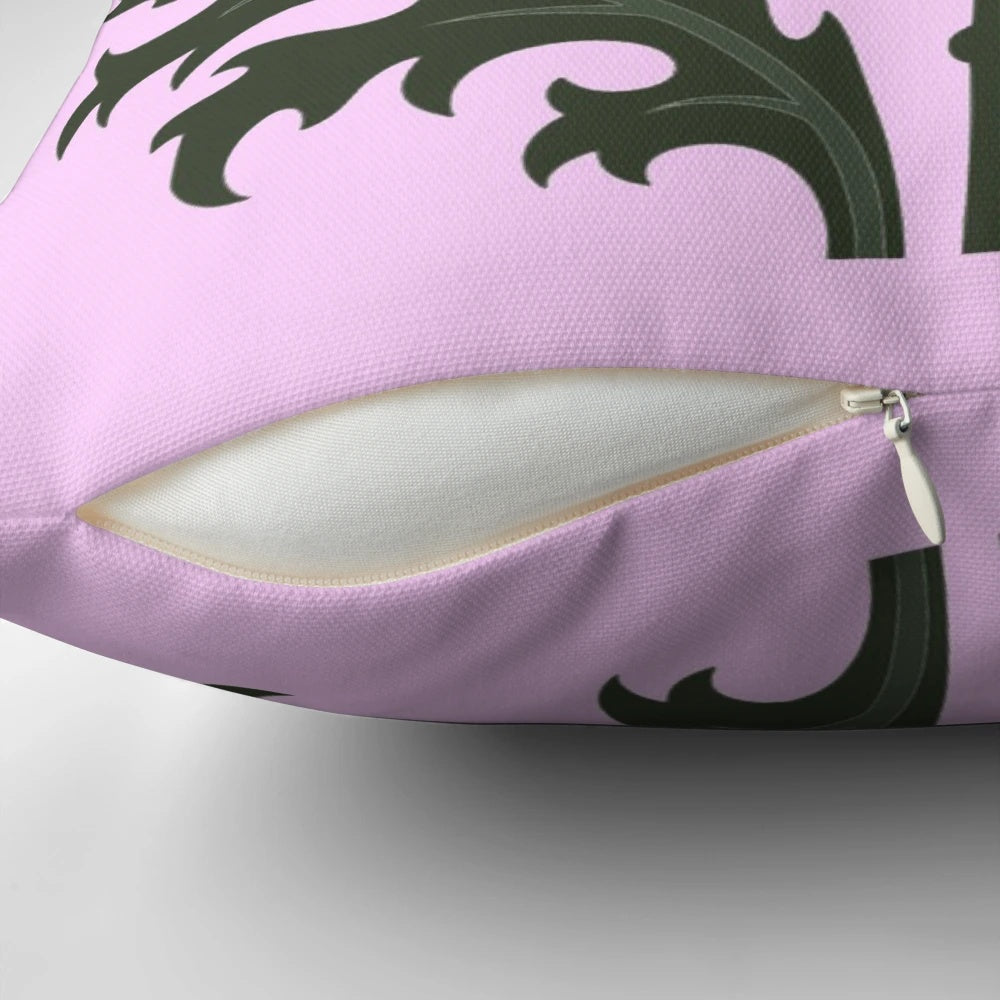 A Scottish thistle flower, the national flower of Scotland, on a pale pink pillow.