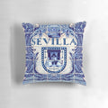 Decorative throw pillow featuring a vibrant blue and white Spanish azulejo tile pattern from Seville, Spain.