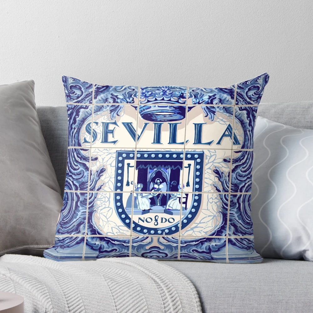 Decorative throw pillow featuring a vibrant blue and white Spanish azulejo tile pattern from Seville, Spain.
