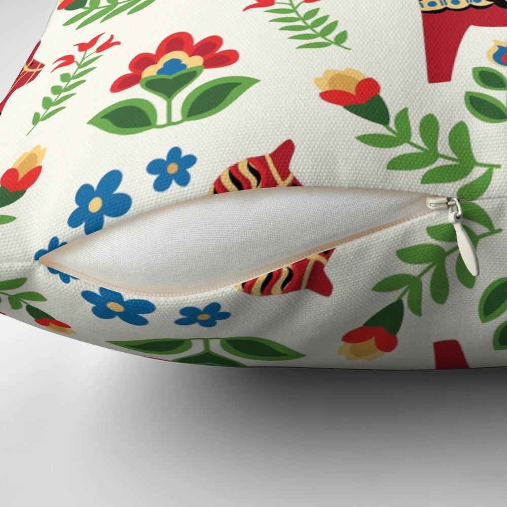Close-up of a traditional red Swedish Dala horse design on a decorative pillow