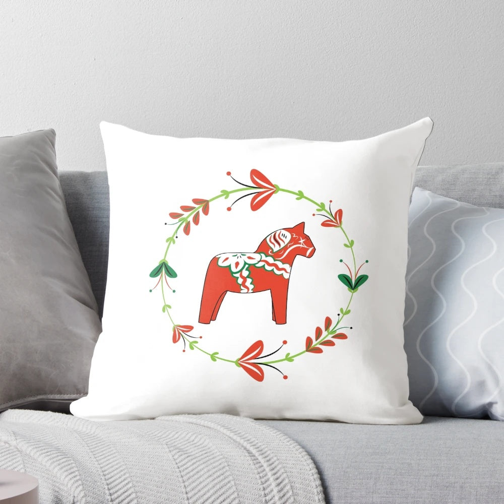 Dala horse pillow with traditional Swedish flower wreath design