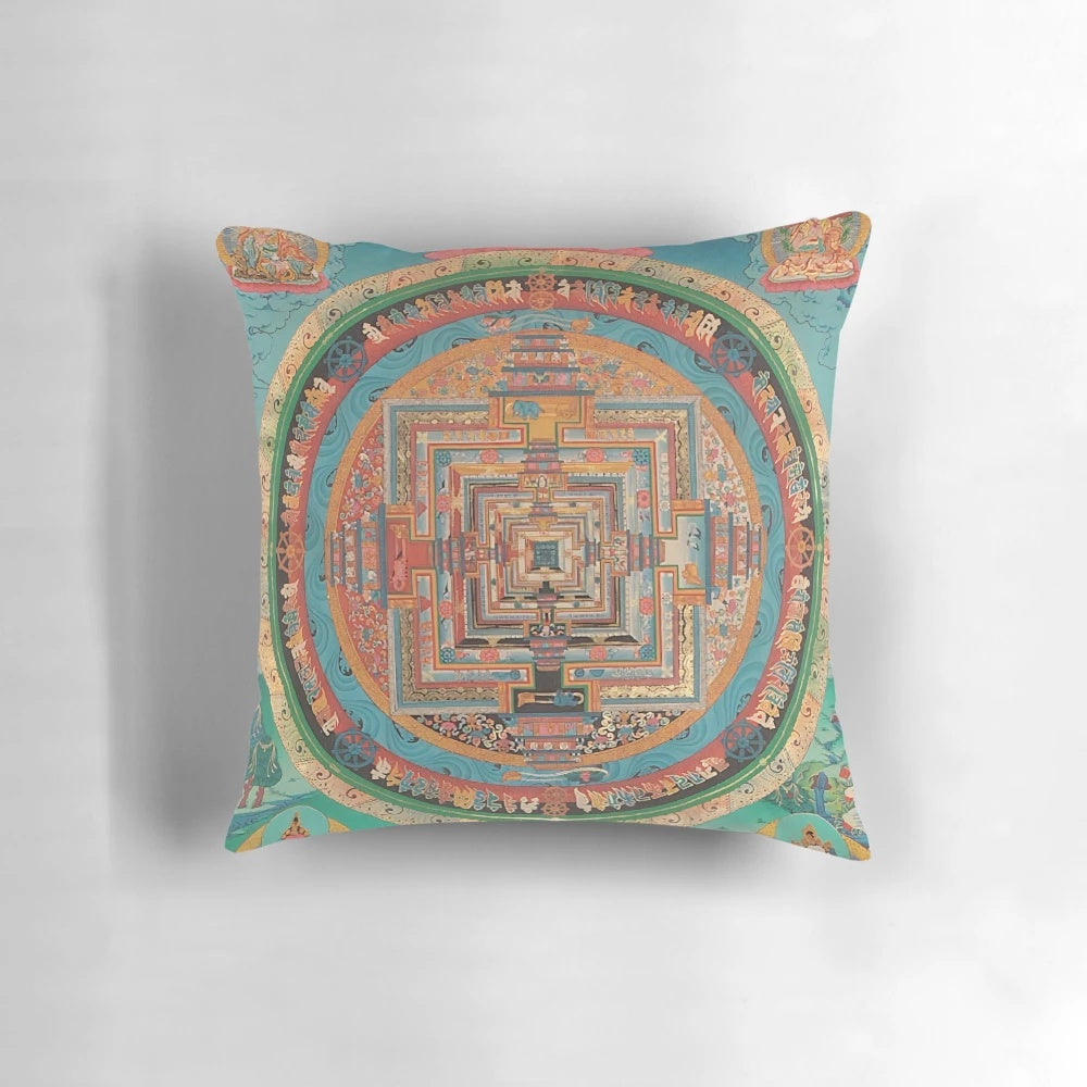 Closeup of a vibrant Tibetan mandala design on a square pillow with meditation-inspired artwork.