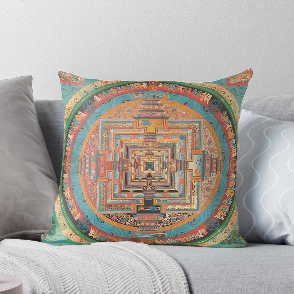 Closeup of a vibrant Tibetan mandala design on a square pillow with meditation-inspired artwork.