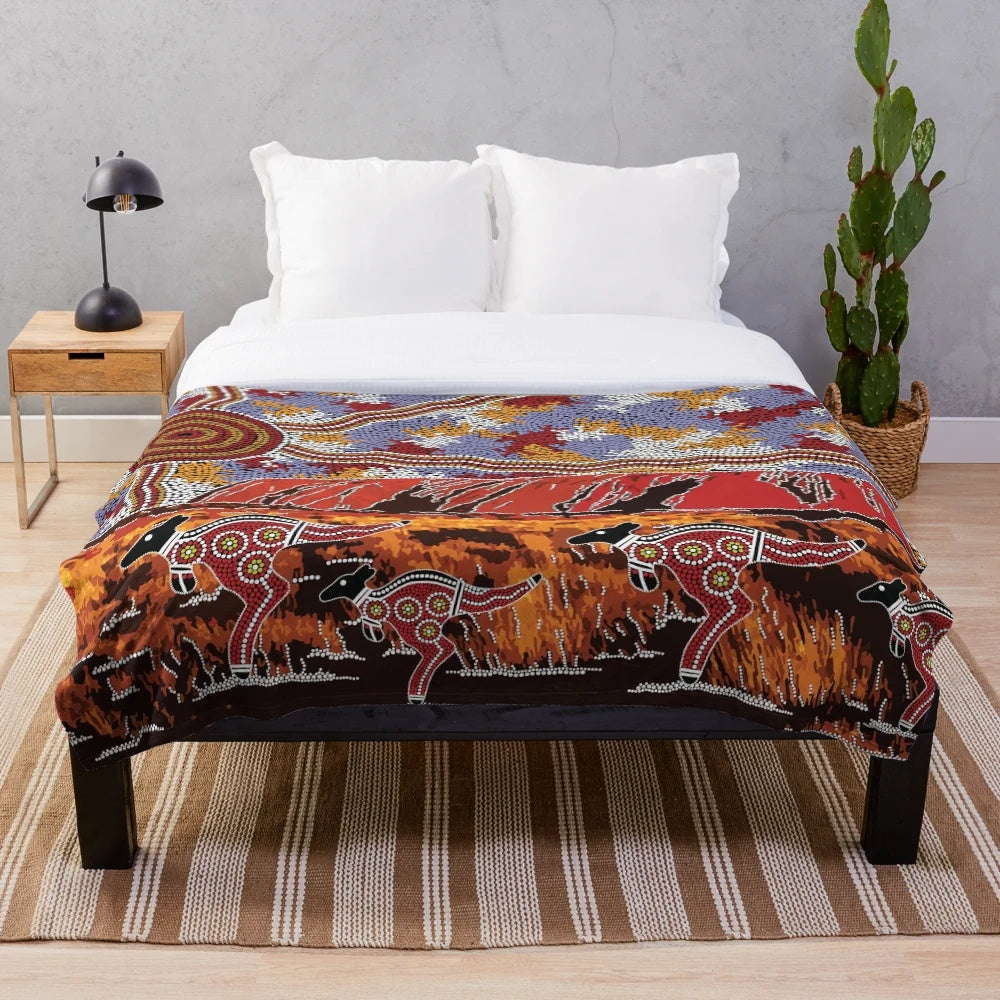 Plush blanket featuring Uluru inspired aboriginal art design