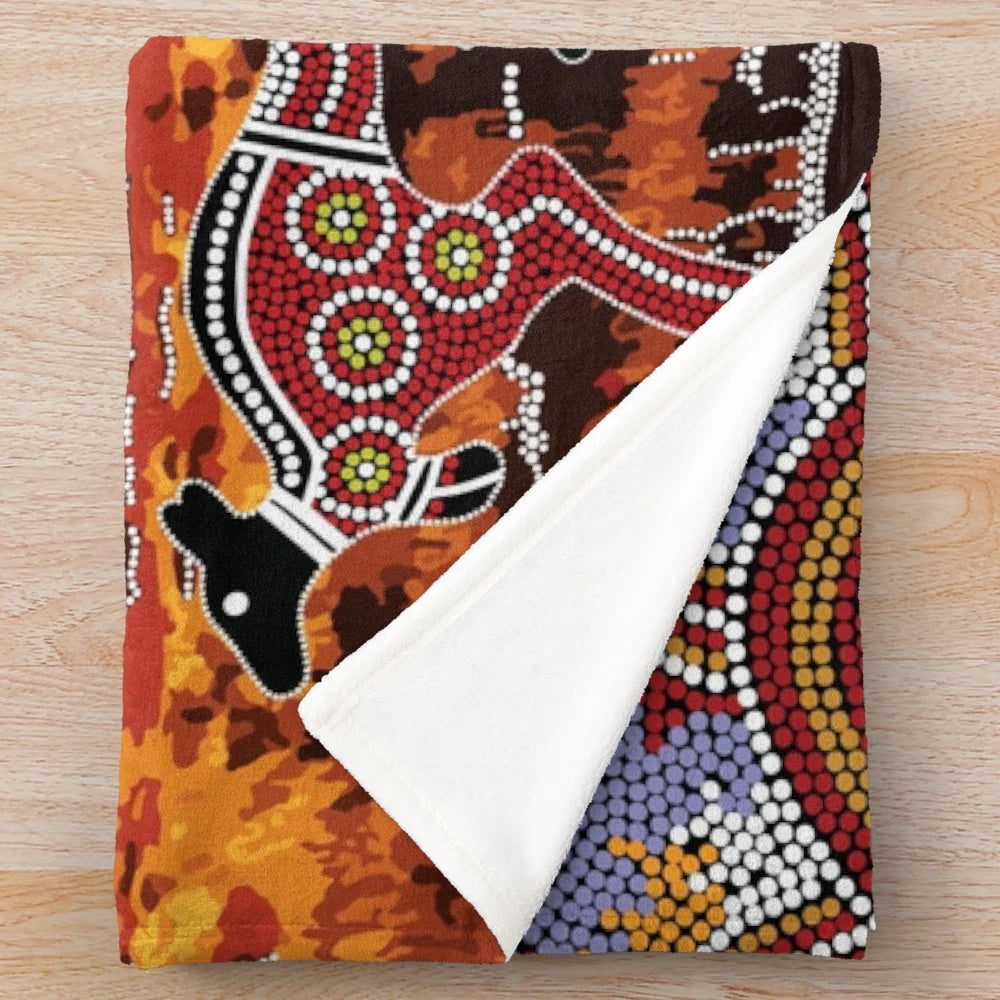 Plush blanket featuring Uluru inspired aboriginal art design