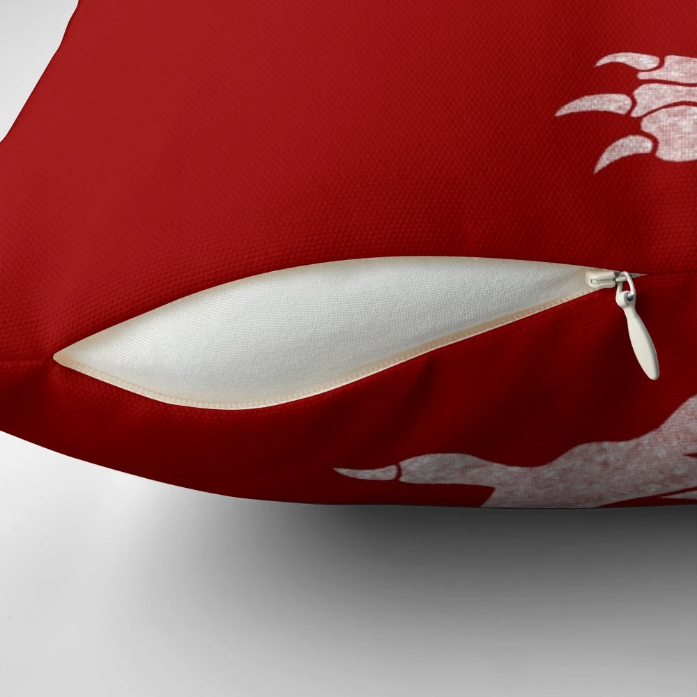 A white pillow with a vibrant Welsh dragon design, perfect for adding a touch of Welsh culture to your home.