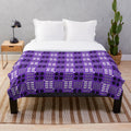Vibrant Welsh tapestry pattern plush blanket in purple