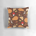 Autumn elements decorative pillow featuring a pattern with leaves, berries, pumpkins, and insects