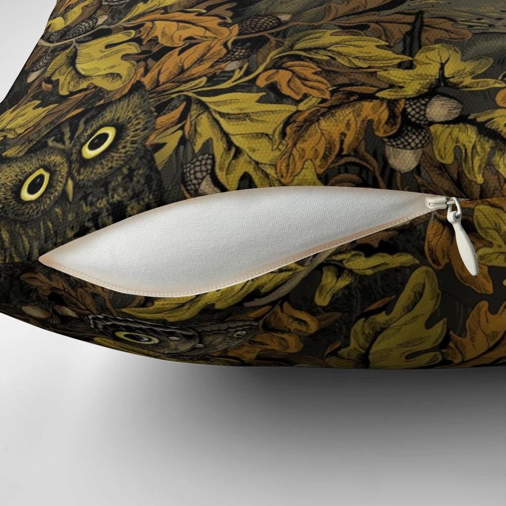 Autumn-inspired camouflage pattern pillow with leaves, acorns, owls, and forest wildlife elements.