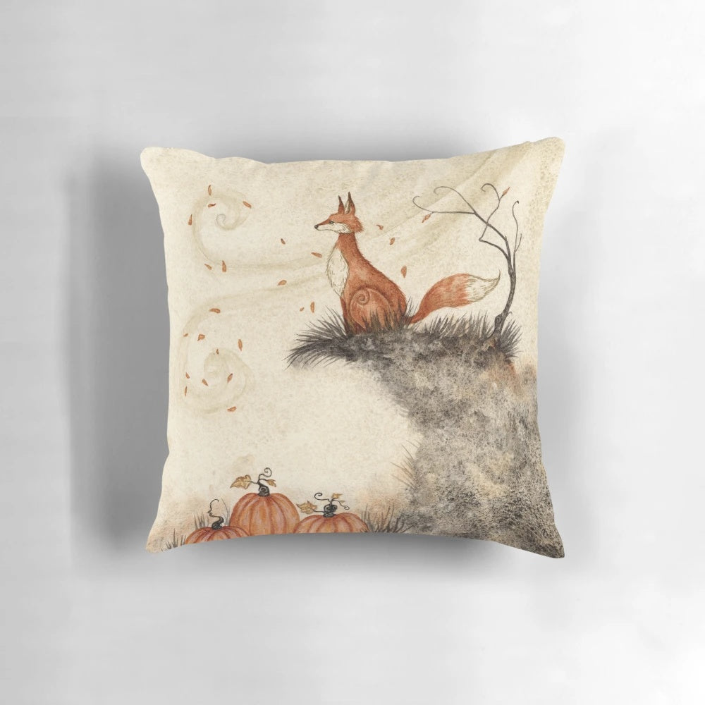 Decorative autumn pillow with a fox sitting in an orange pumpkin patch