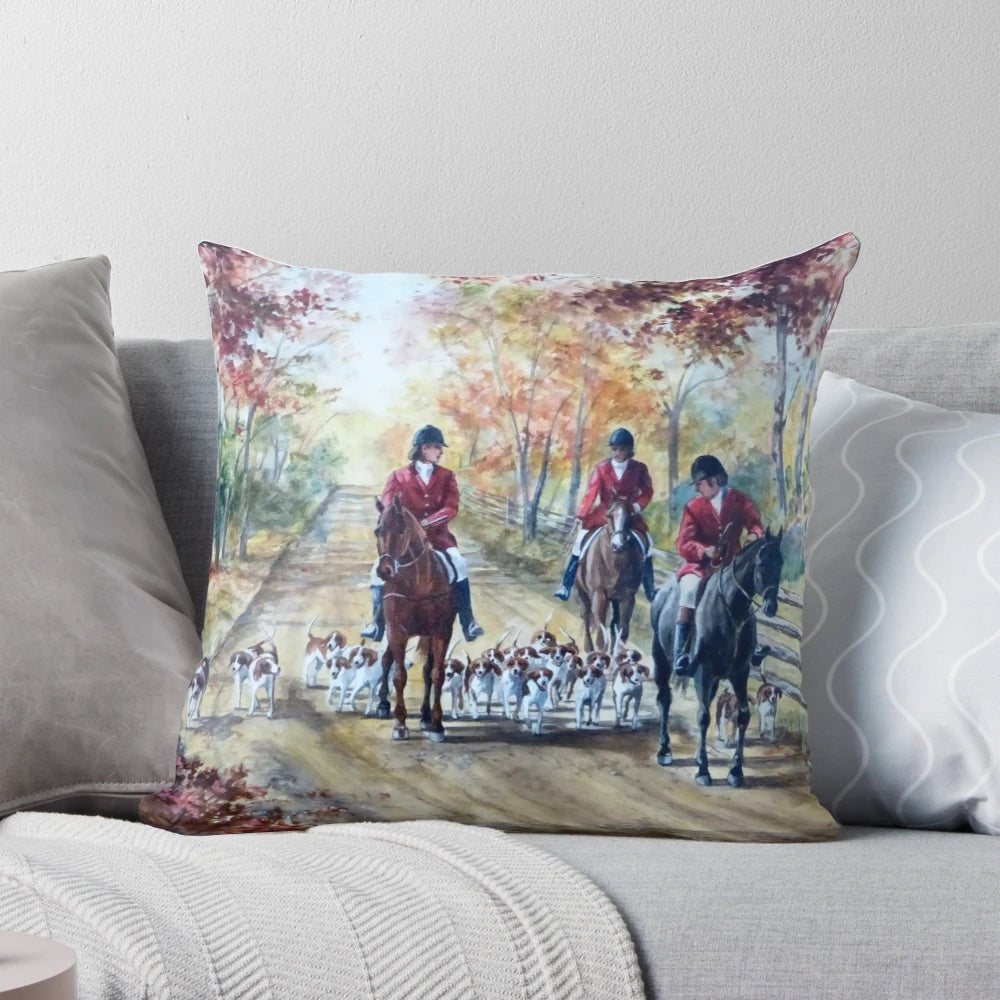 Autumn-themed decorative pillow featuring horses and hounds in a fox hunt design
