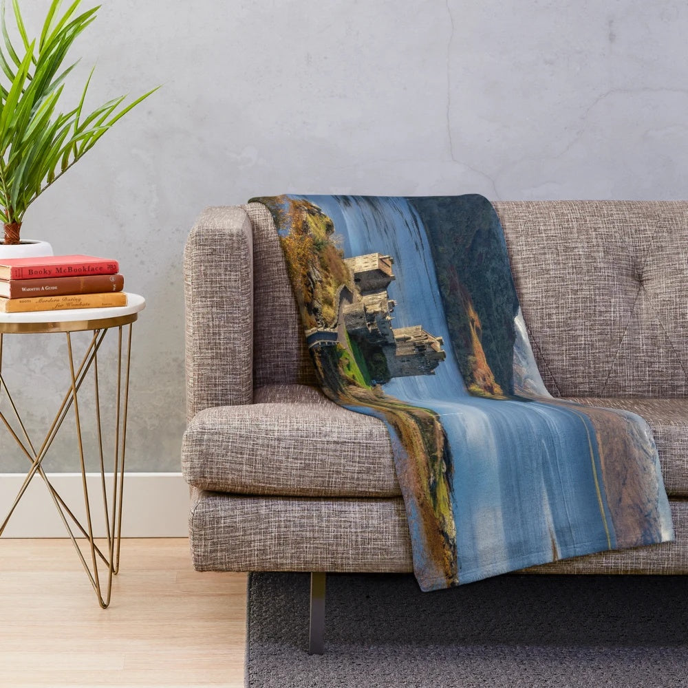Plush blanket featuring the scenic autumn landscape of Eilean Donan Castle and the Isle of Skye, Scotland