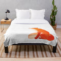 Cozy plush blanket featuring a fox design in autumn colors