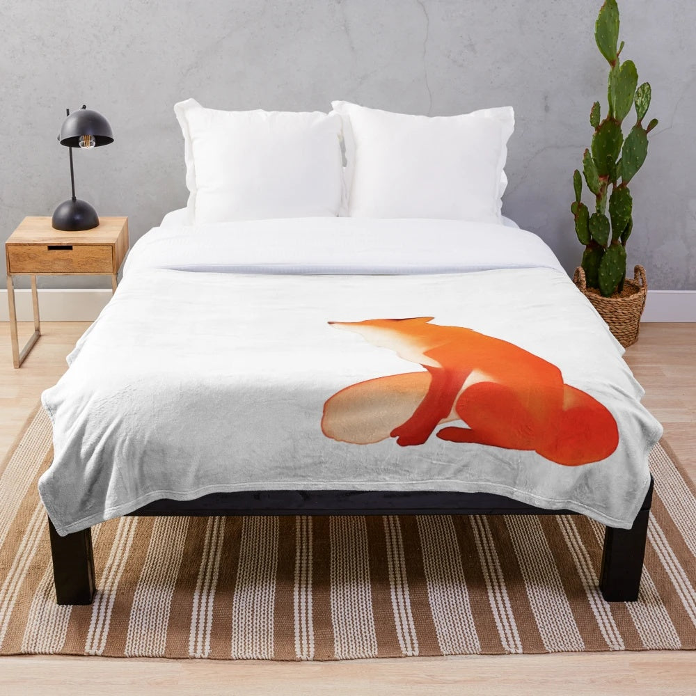 Cozy plush blanket featuring a fox design in autumn colors