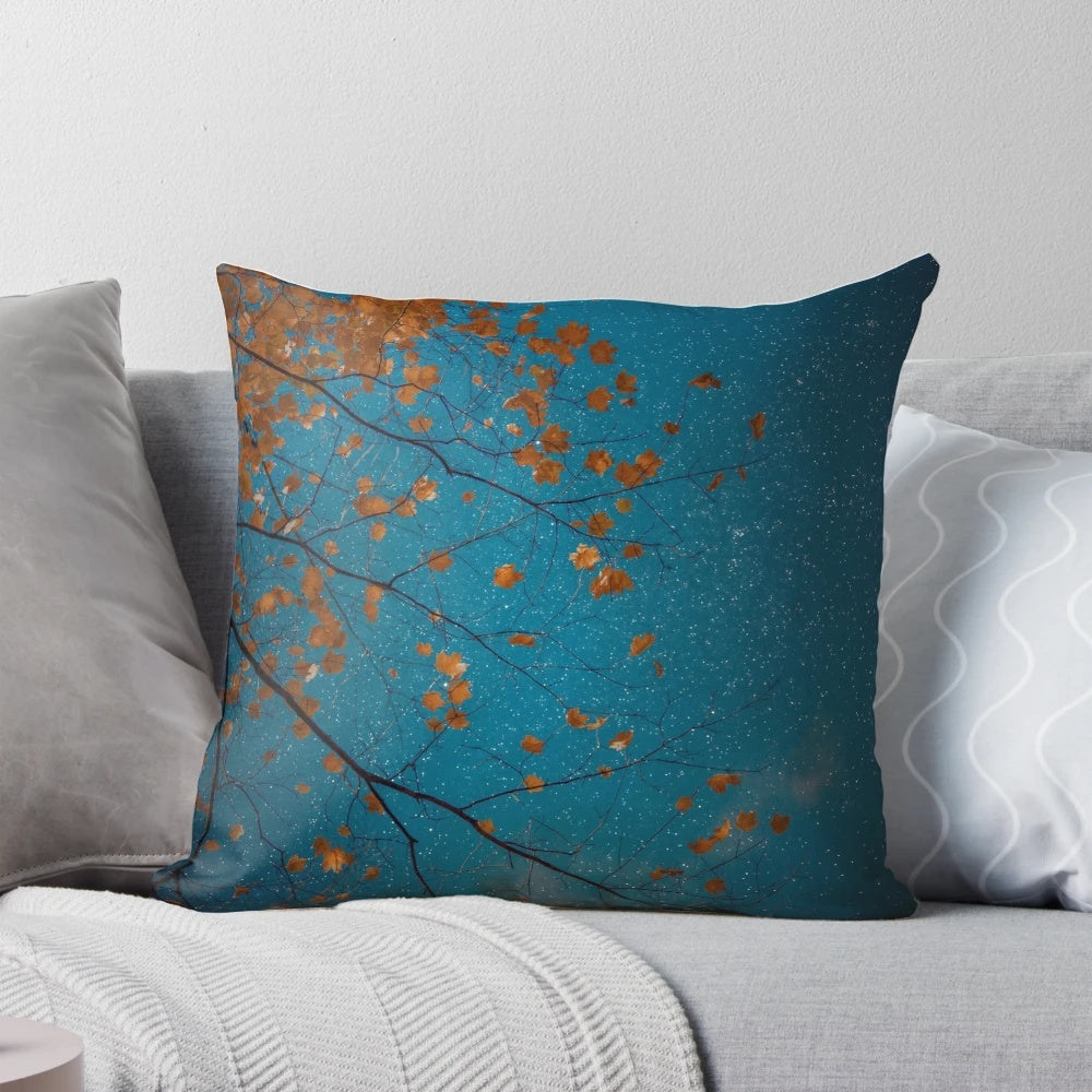 Pillow featuring a beautiful nature photograph of burnt orange maple leaves against a midnight blue sky with stars.