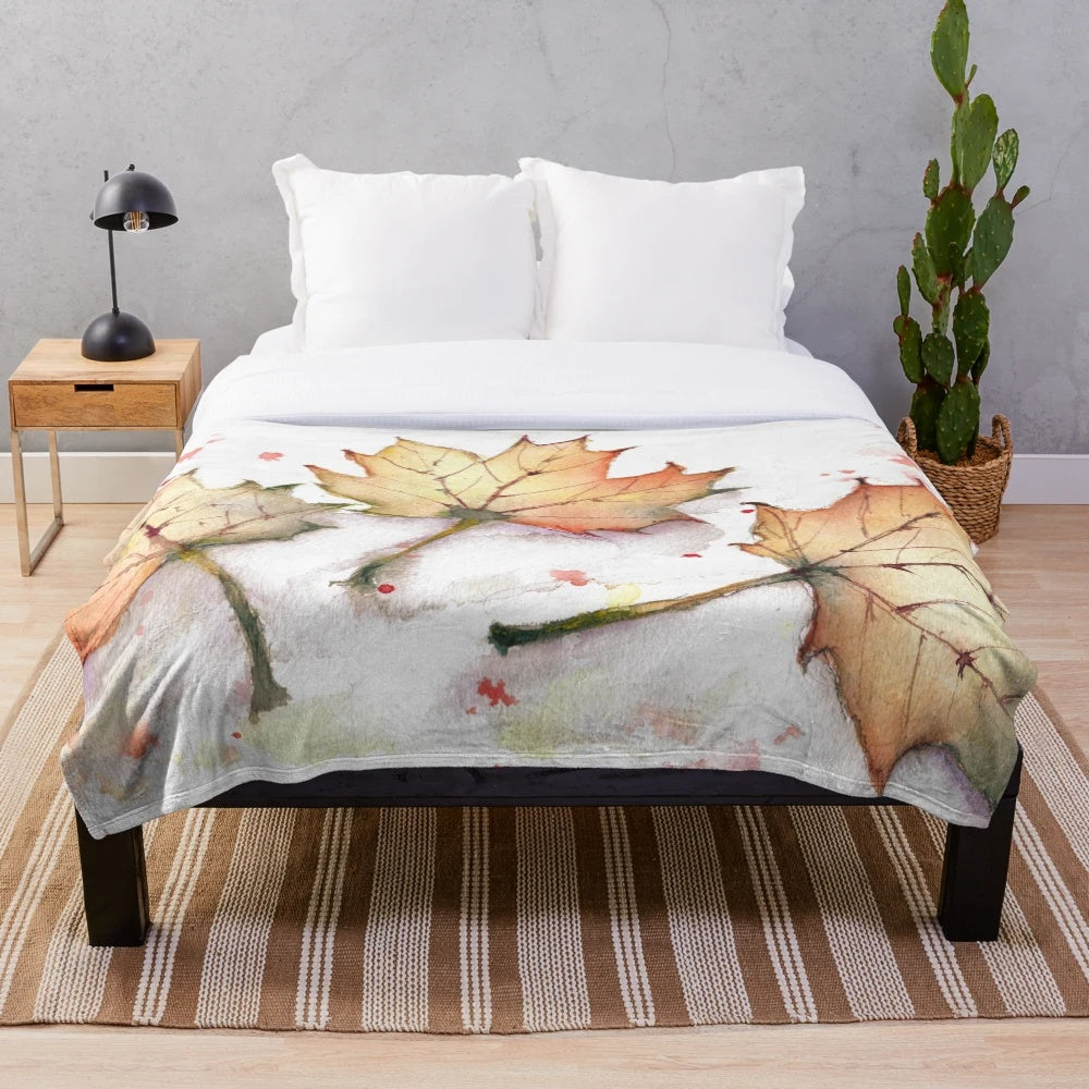 Plush blanket with vibrant autumn leaves design