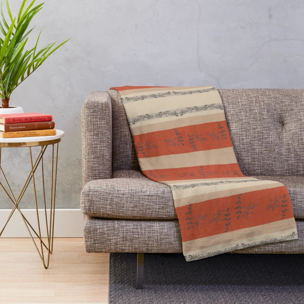 Autumn leaves plush blanket with rust, brown, and tan colors