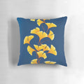 Autumn Melody Pillow featuring a nature-inspired design with leaves in yellow, blue, and green hues