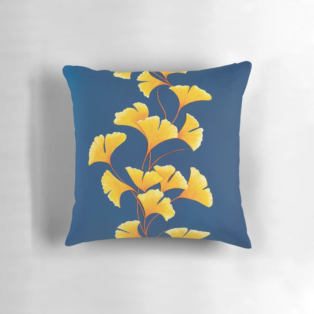 Autumn Melody Pillow featuring a nature-inspired design with leaves in yellow, blue, and green hues
