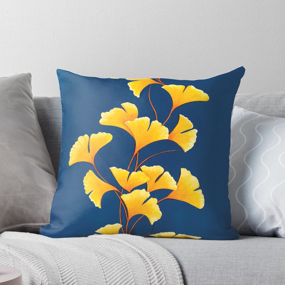 Autumn Melody Pillow featuring a nature-inspired design with leaves in yellow, blue, and green hues