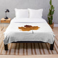 Autumn nature inspired plush blanket featuring a minimalist watercolor leaf design