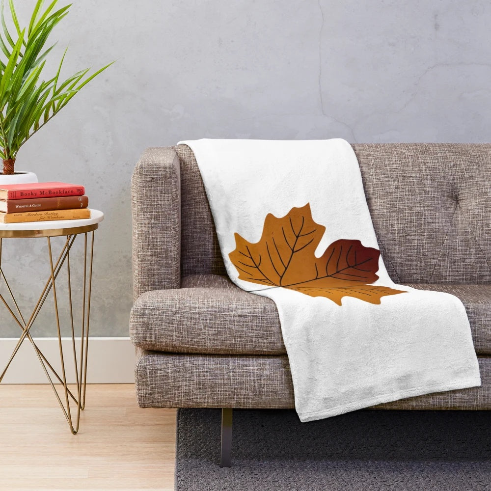 Autumn nature inspired plush blanket featuring a minimalist watercolor leaf design