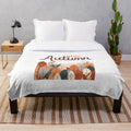 Autumn nature themed plush blanket with minimalist leaf pattern design