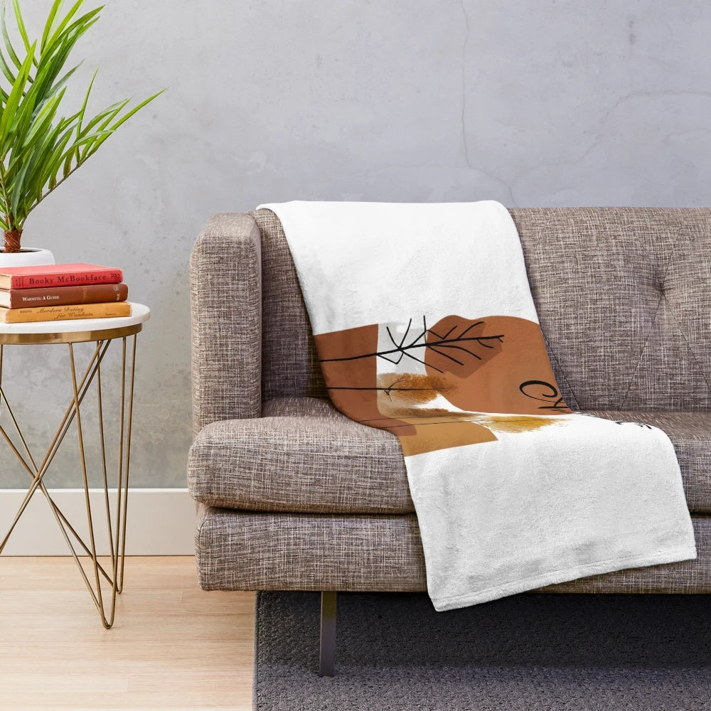 Autumn nature plush blanket with a minimalist leaf pattern design