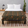Soft, plush blanket featuring an autumn-inspired fox design