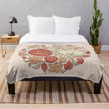Autumn plush blanket featuring a jackalope and jack-o-lantern design
