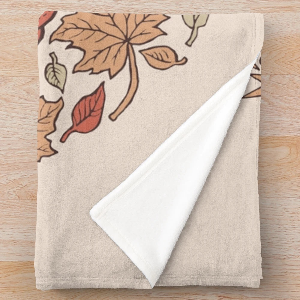 Autumn plush blanket featuring a jackalope and jack-o-lantern design