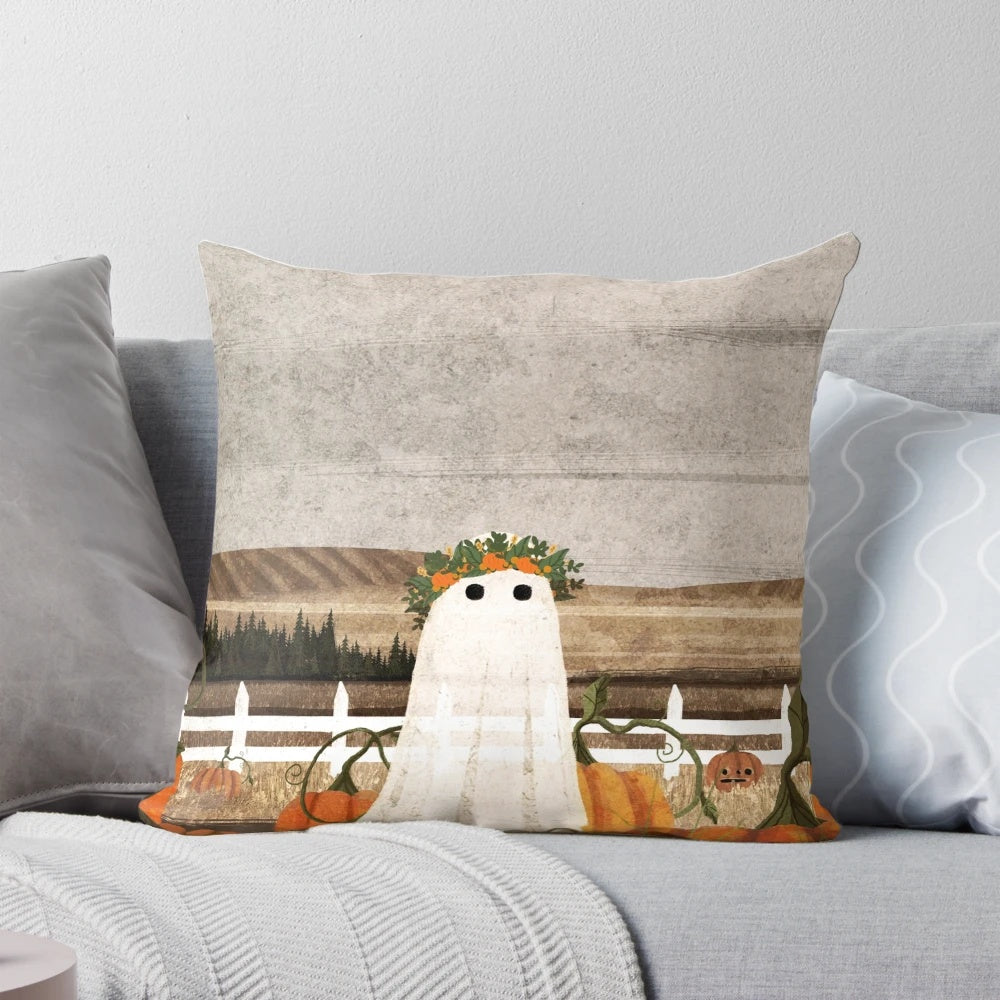 A vintage-inspired throw pillow featuring a ghostly figure in a pumpkin patch landscape.