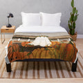 Autumn pumpkin plush blanket with haunted folk art ghost design