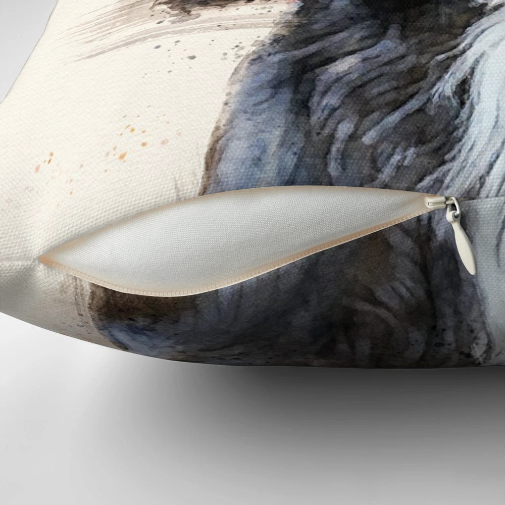 A decorative autumn-themed pillow featuring a beautiful black spaniel dog breed.