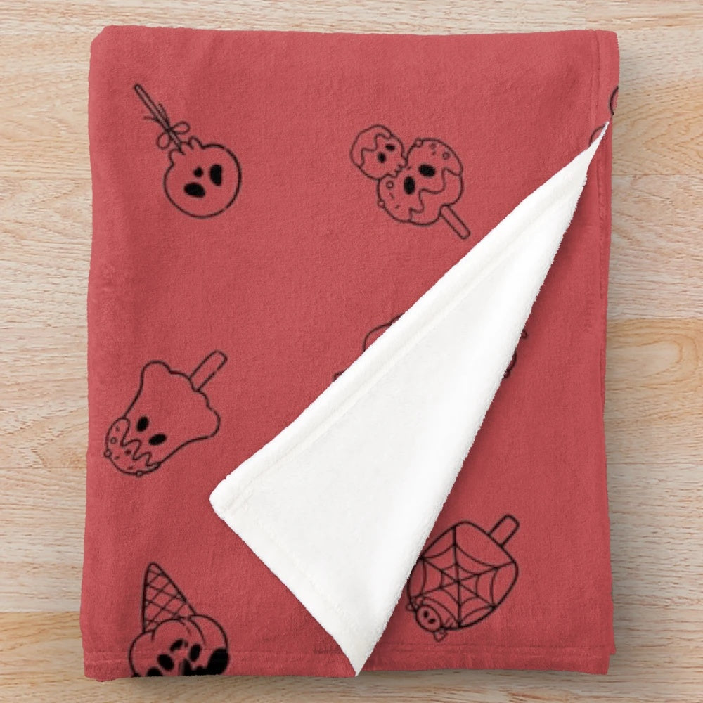 Cozy fall leaf red plush blanket with spooky ice cream design