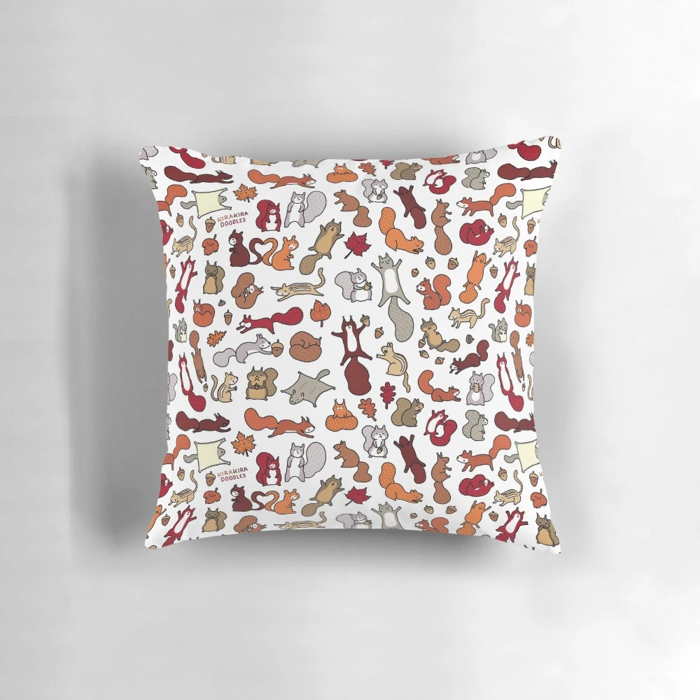 Vibrant doodle illustration of playful squirrels on a decorative autumn-themed pillow