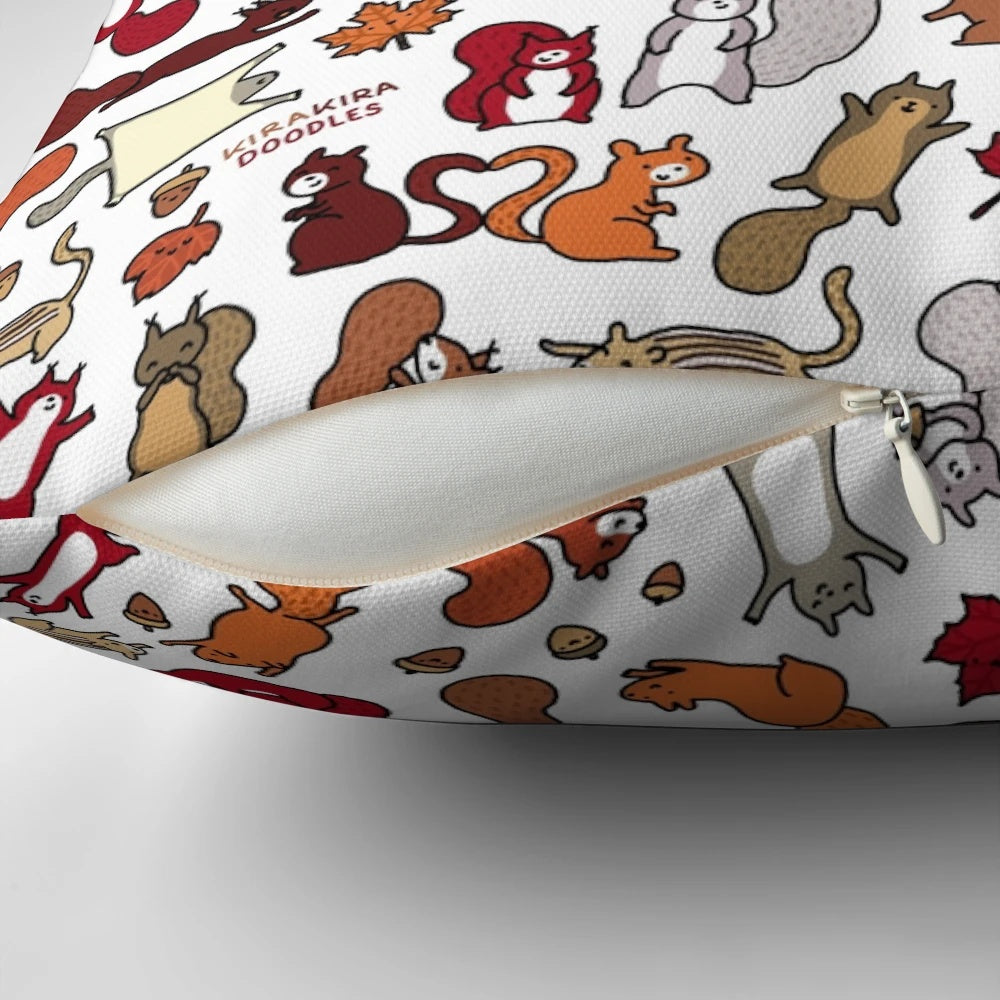 Vibrant doodle illustration of playful squirrels on a decorative autumn-themed pillow