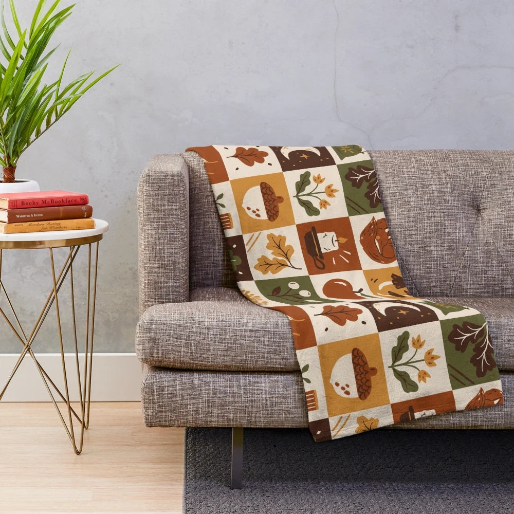 Fall equinox plush blanket with botanical and nature-inspired design