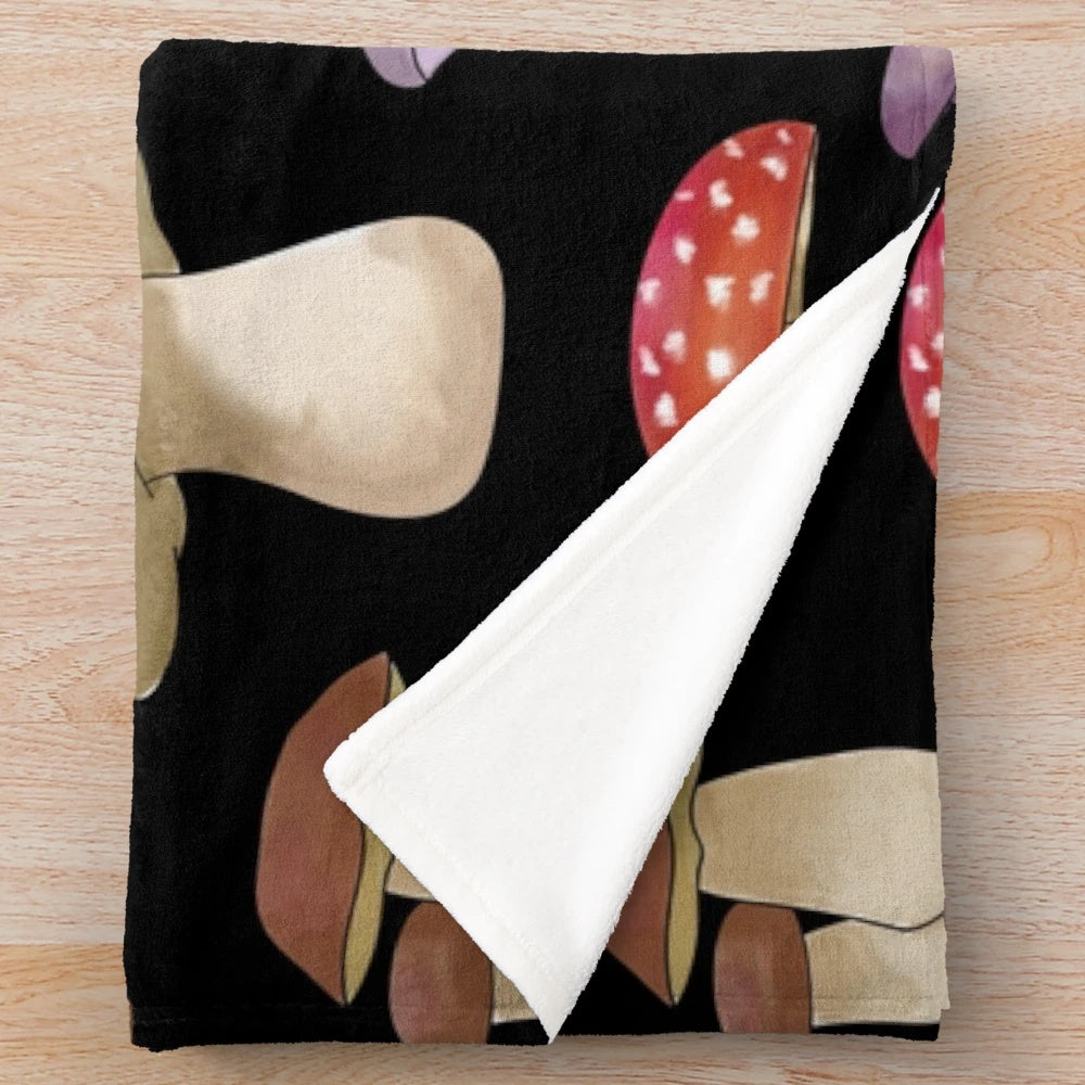 Plush blanket featuring a hand-painted design of autumnal mushrooms and pastel-colored foliage