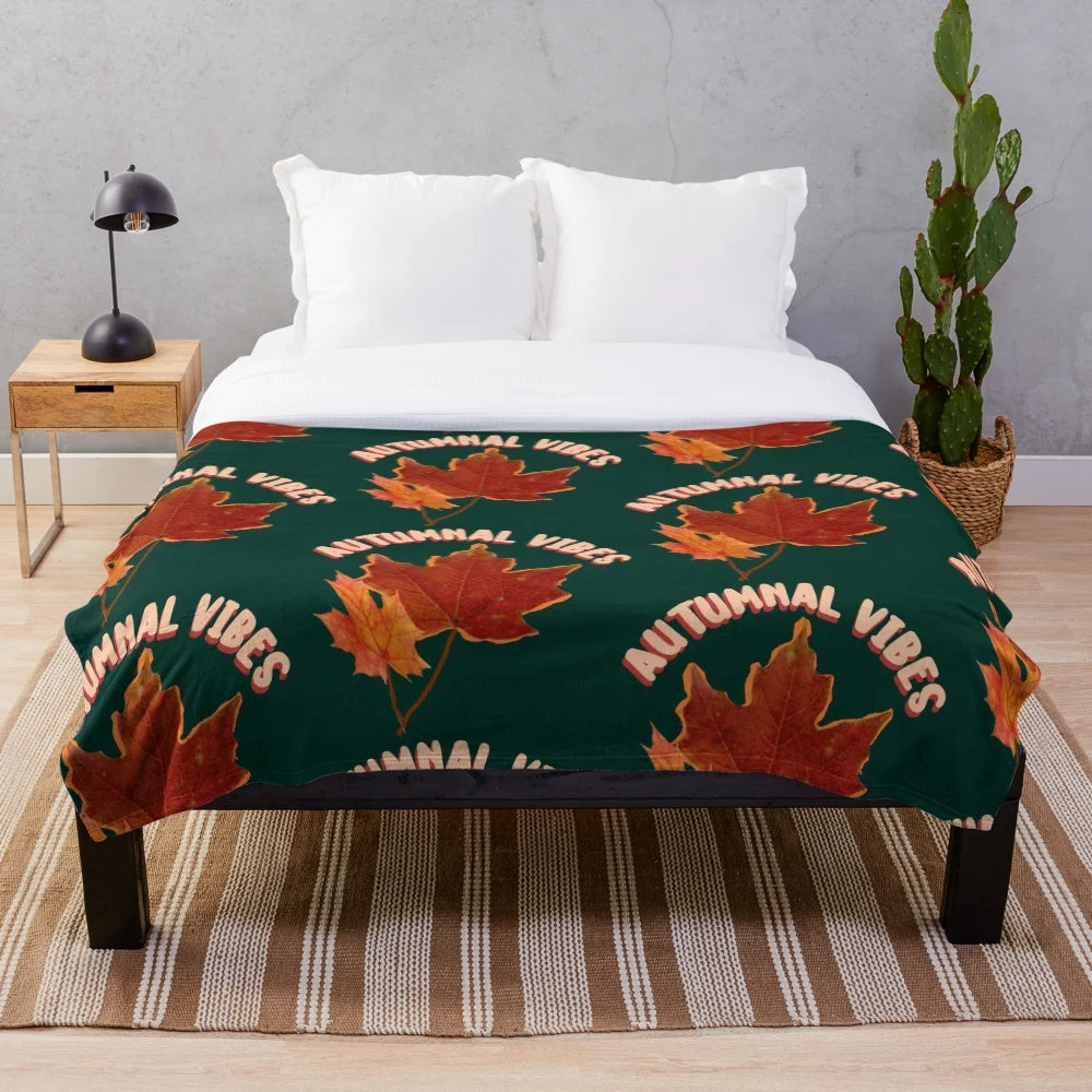 Cozy and soft plush blanket with a beautiful autumnal maple leaf pattern