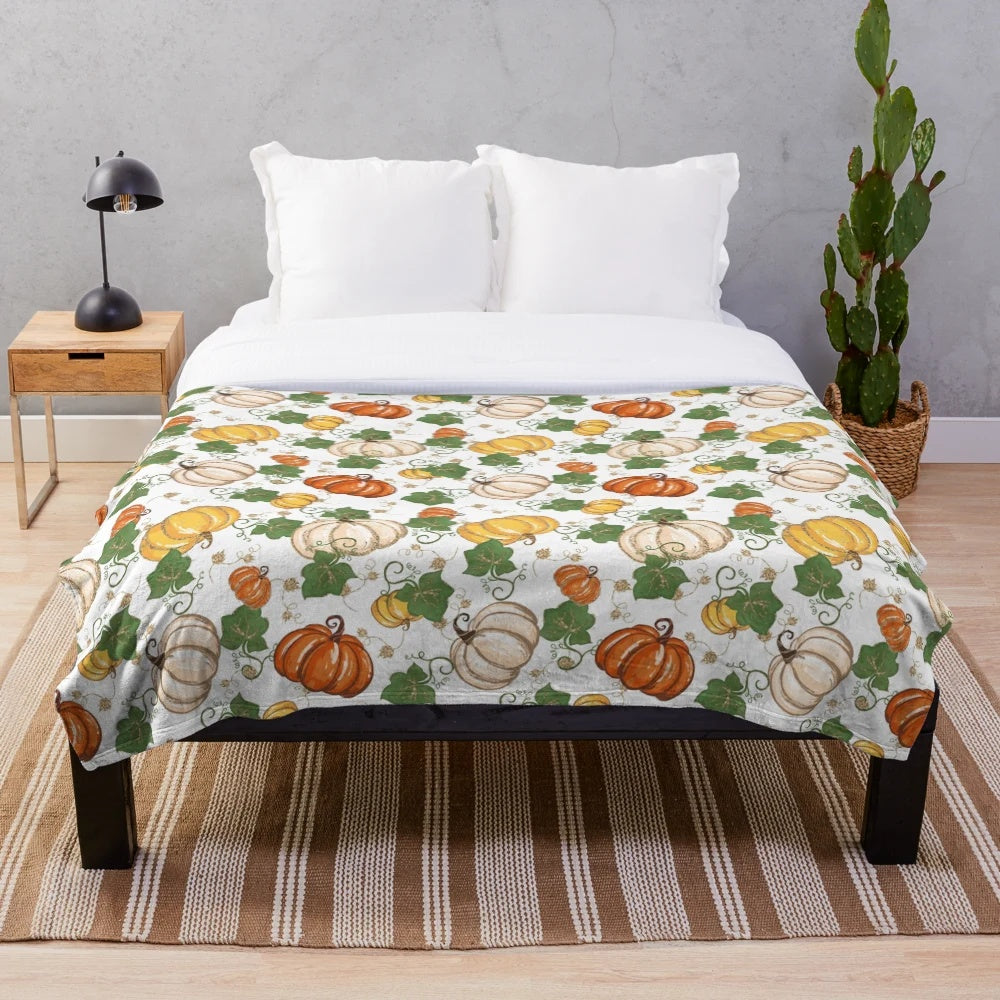 Plush blanket with a glittery pumpkin patch design, perfect for autumn