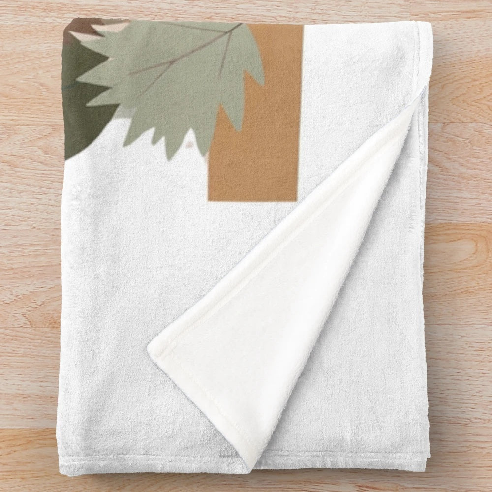 Plush blanket featuring a cozy autumn-themed hedgehog and forest animal design