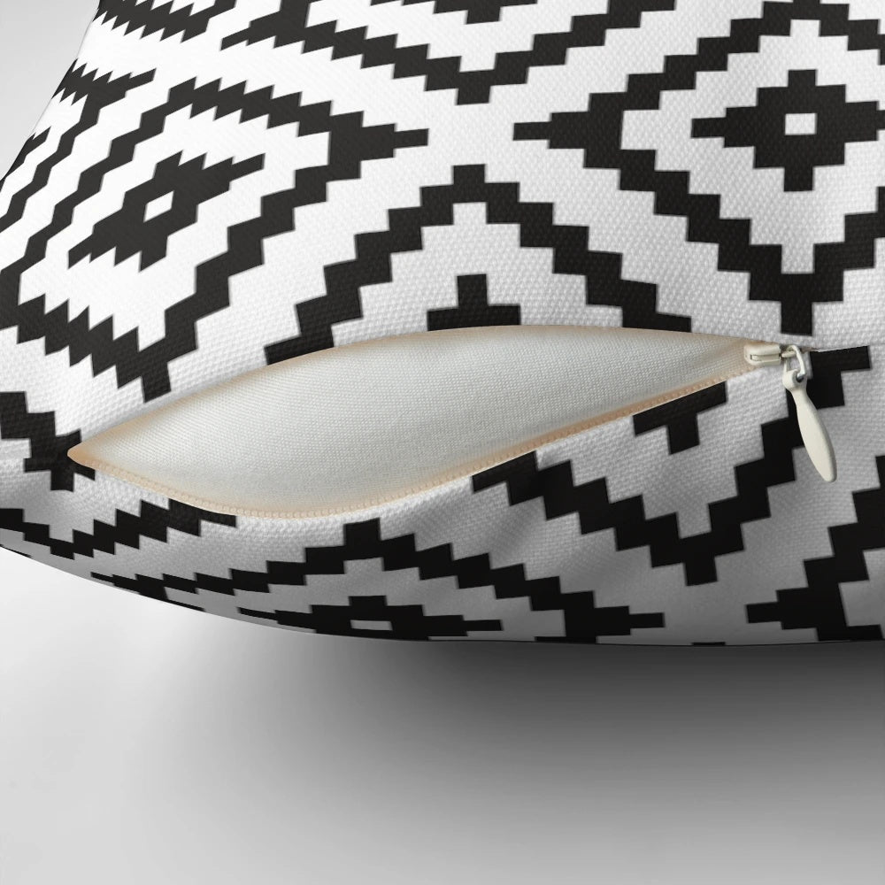 Aztec-inspired black and white throw pillow with tribal pattern design, perfect for modern farmhouse home decor.