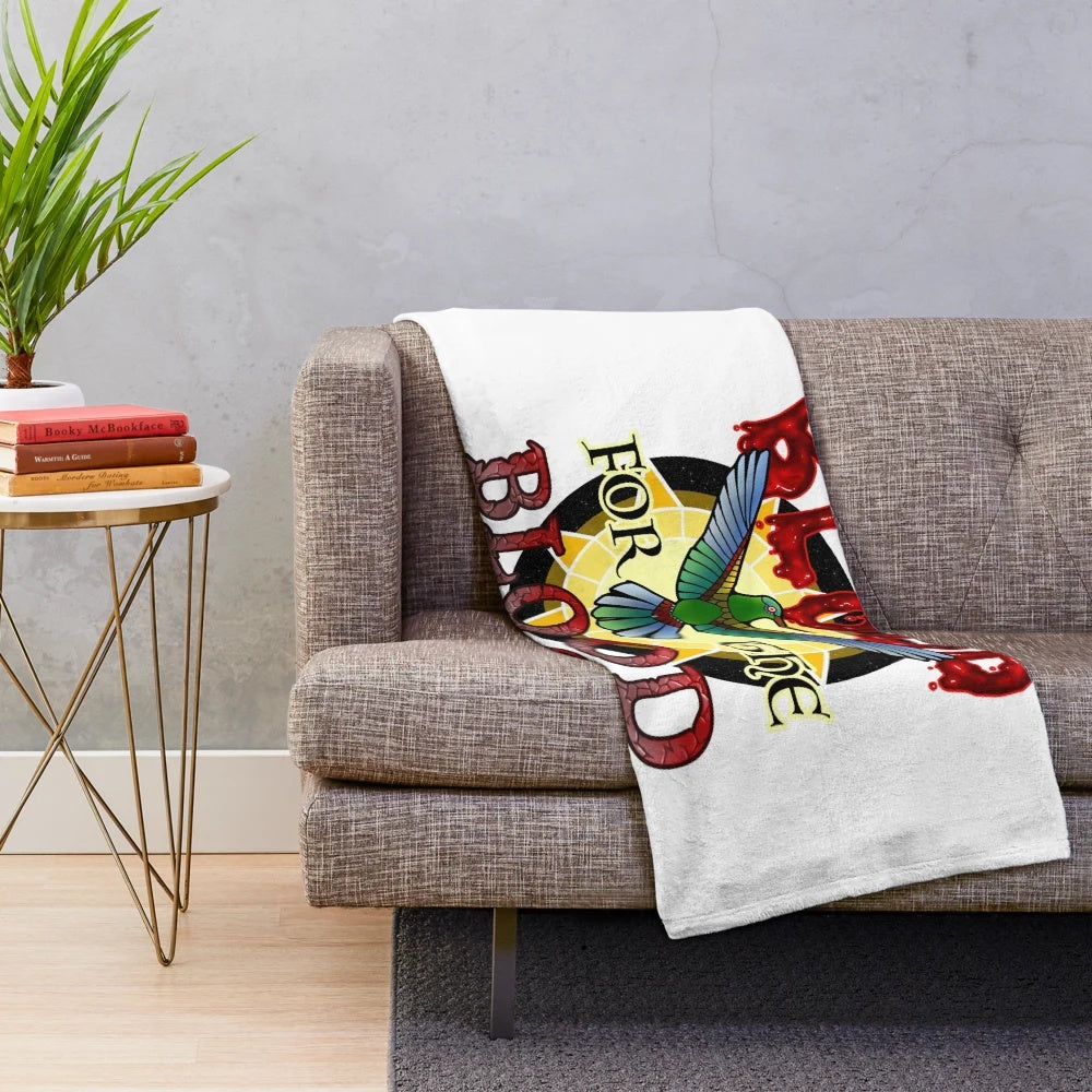 Aztec-inspired plush blanket with blood god design