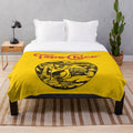 Aztec princess-inspired plush blanket featuring the worn and washed Topo Chico mineral water logo