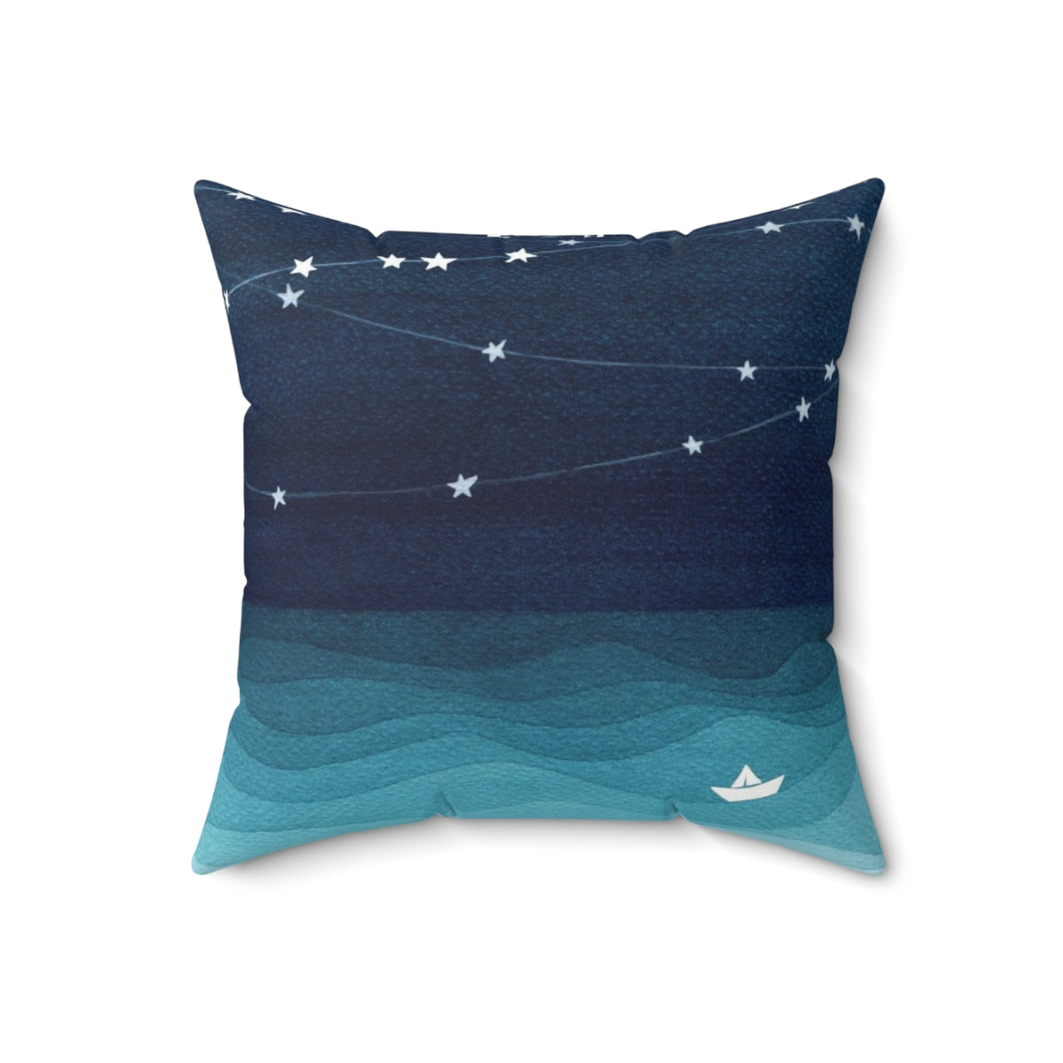 Teal and white pillow with a garland of stars design, depicting a paper boat sailing on the ocean. - Back