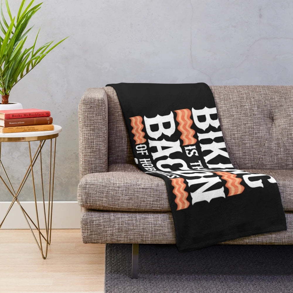 Mountain biking plush blanket with a bacon design