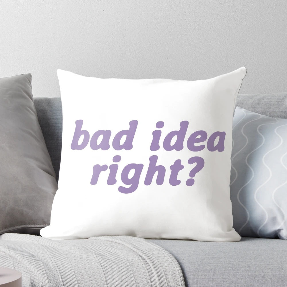 Olivia Rodrigo inspired white pillow with "Bad Idea Right?" design