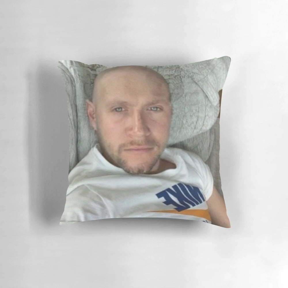 Bald Niall Horan portrait printed on a soft, plush pillow