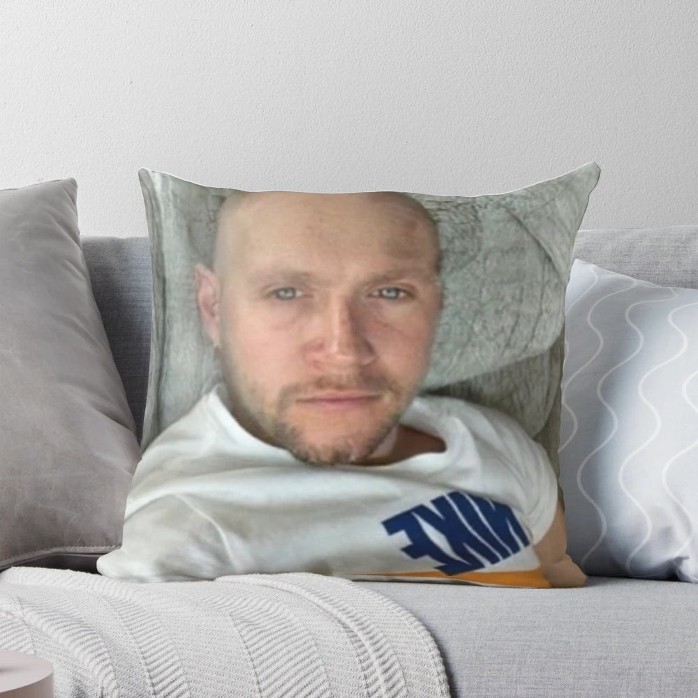 Bald Niall Horan portrait printed on a soft, plush pillow